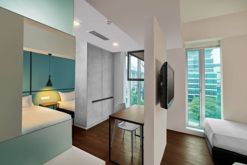 Before refurbishment at the Ruemz en-suite twin room