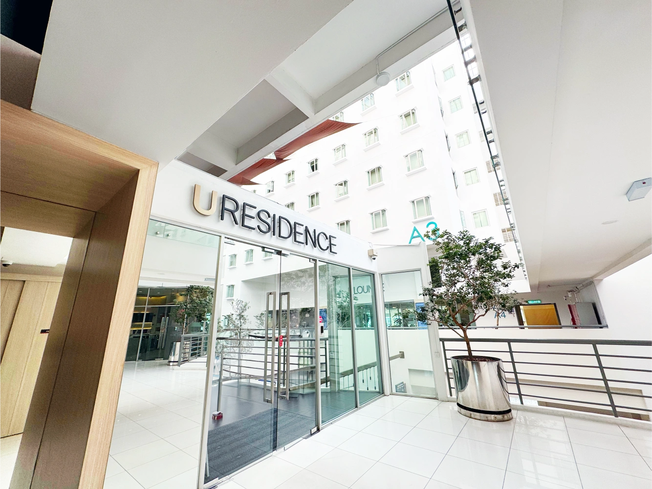 After refurbishment at the U Residence entrance